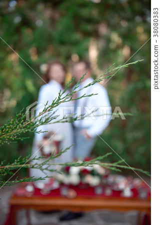 Young couple in white shirts blurred on background 38080383