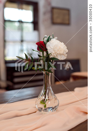 Romantic arrangement of red and white flowers Romantic arrangement of red and white flowers 38080410