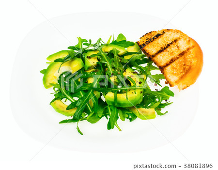 Vitamin vegetarian salad from arugula and avocado Vitamin vegetarian salad from arugula and avocado 38081896