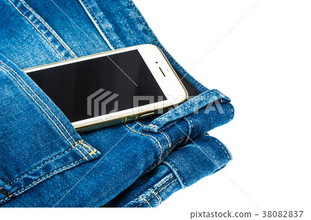 Mobile phone in the pocket of the blue jeans Mobile phone in the pocket of the blue jeans 38082837