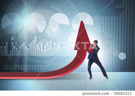 Businessman supporting growtn in economy on chart Businessman supporting growtn in economy on chart 38083321