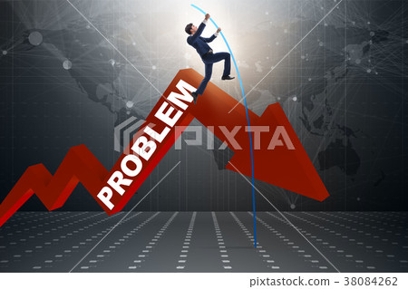 Businessman pole vaulting over problems in 38084262