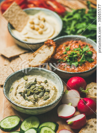 Vegetarian dips hummus, babaganush, muhammara over Vegetarian dips hummus, babaganush, muhammara over 38085577