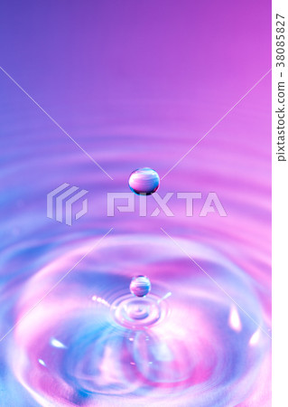 Water droplets and ripples 38085827