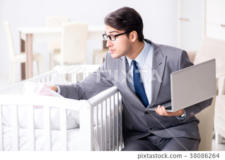 Young businessman trying to work from home caring 38086264
