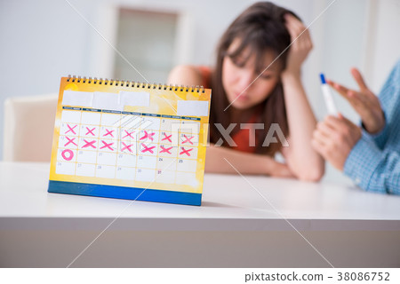 Young family in pregnancy planning concept with Young family in pregnancy planning concept with 38086752