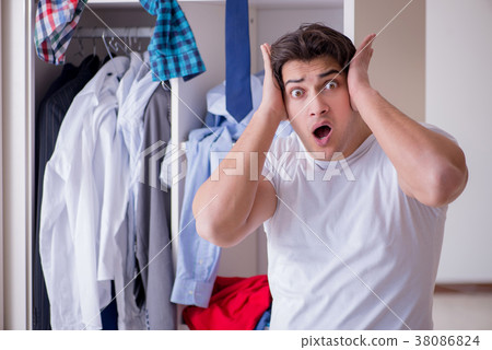 Man helpless with dirty clothing after separating Man helpless with dirty clothing after separating 38086824