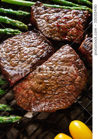 Cooking the steak on barbeque Cooking the steak on barbeque 38088490