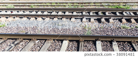Rails from the train window as a background Rails from the train window as a background 38091481