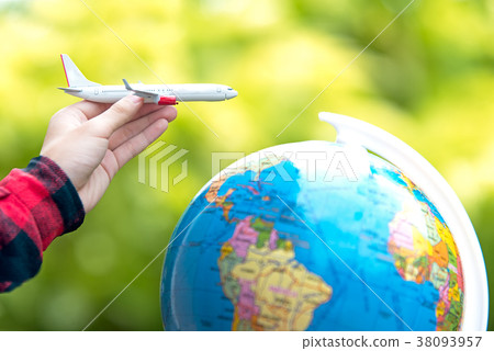 Tourist holding airplane  flight travel  38093957