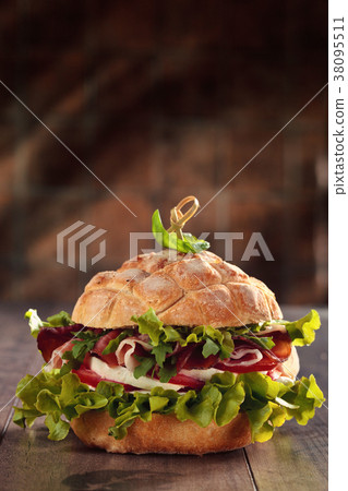 Tasty Italian sandwich. 38095511