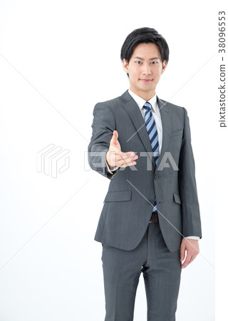 A businessman shaking hands A businessman shaking hands 38096553