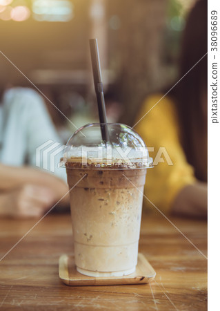 iced milk coffee on wood table chill drink iced milk coffee on wood table chill drink 38096689