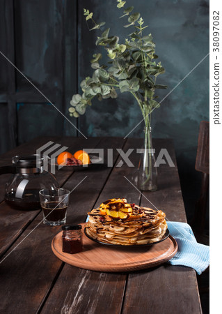 Fresh homemade french crepes made with eggs, milk Fresh homemade french crepes made with eggs, milk 38097082