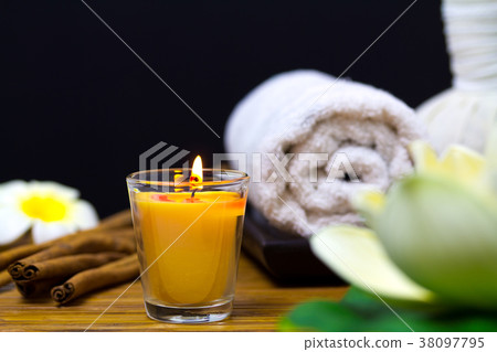 Spa concept with flowers, stone, candle Spa concept with flowers, stone, candle 38097795