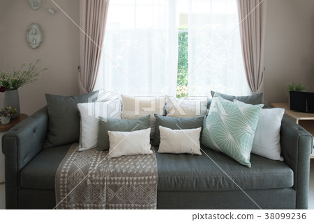 Lounge sofa and colorful pillow in lounge  38099236