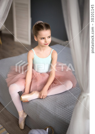 Cute little girl dreams of becoming a ballerina.  38101145