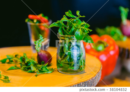 rugula (rocket) salad Vegetable decoration in jar rugula (rocket) salad Vegetable decoration in jar 38104832