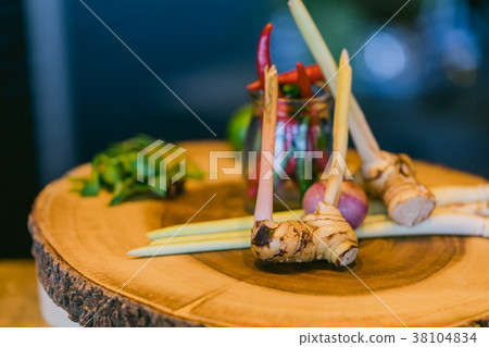 Herb on wooden.Galanga (Alpinia galanga SW.) 38104834