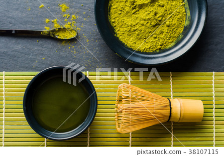 Flat lay of organic green tea powder (Matcha) Flat lay of organic green tea powder (Matcha) 38107115