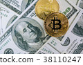Top view of Bitcoin on Dollar banknote (Fintech) 38110247