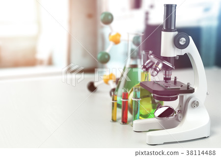 Microscope with lab glassware, flasks and colbs Microscope with lab glassware, flasks and colbs 38114488