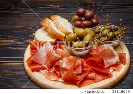 Meat plate of Italian prosciutto crudo or spanish 38116639