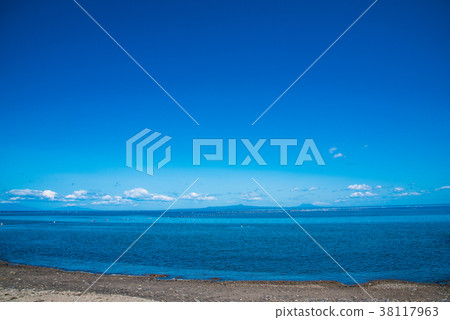 Nemuro Strait overlooking Kunisaki Island from Notsuke Peninsula 38117963