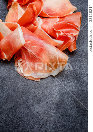 Italian prosciutto crudo or spanish jamon. Raw ham 38118214