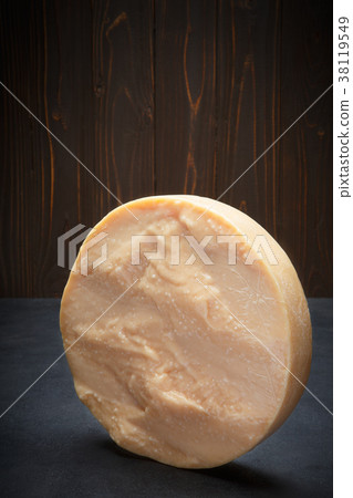 Whole round Head of parmesan or parmigiano hard Whole round Head of parmesan or parmigiano hard 38119549