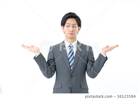 Businessman raising both hands Businessman raising both hands 38123584