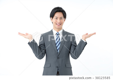 Businessman raising both hands 38123585