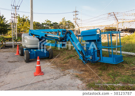 Blue articulated boom lift for construction work 38123787