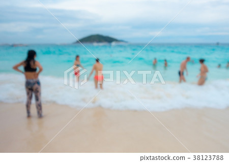 Vacation and fun on the beach, motion blurred  38123788