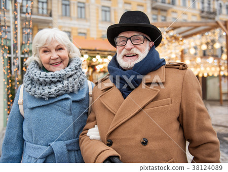 Cheerful old man and woman relaxing in city 38124089