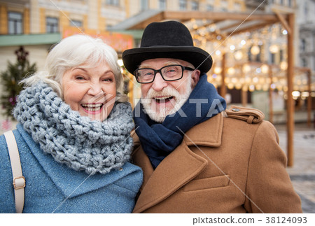 Joyful senior man and woman having fun in city 38124093