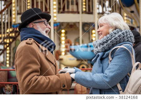 Cheerful old man and woman enjoying romantic date 38124168