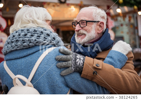 Happy mature couple expressing their love Happy mature couple expressing their love 38124265