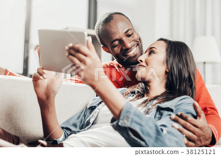 Two happy enamored people passing the time with 38125121