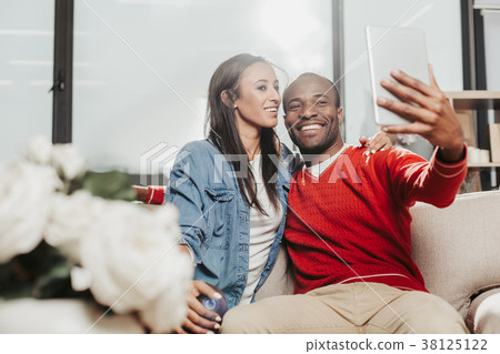 Enjoyed pair making selfie with tab at home 38125122