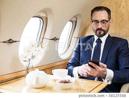 Peaceful gentleman having business trip 38125588