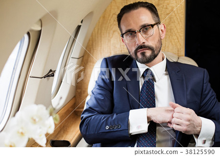 Solid man making business trip 38125590