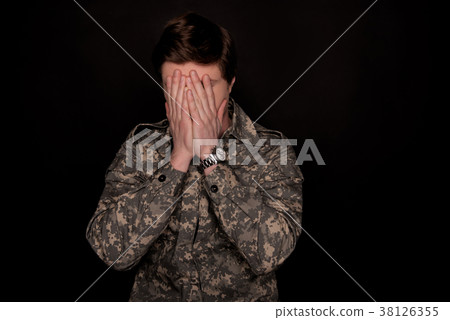 Upset military man feeling helpless Upset military man feeling helpless 38126355