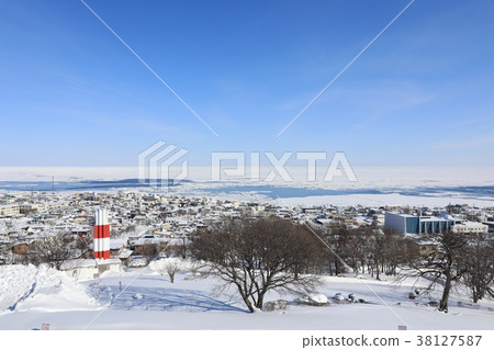 Ice floe and Monbetsu lighthouse seen from ice floe observatory 2018 Ice floe and Monbetsu lighthouse seen from ice floe observatory 2018 38127587