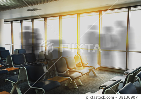 Empty airport terminal waiting area with chairs Empty airport terminal waiting area with chairs 38130907