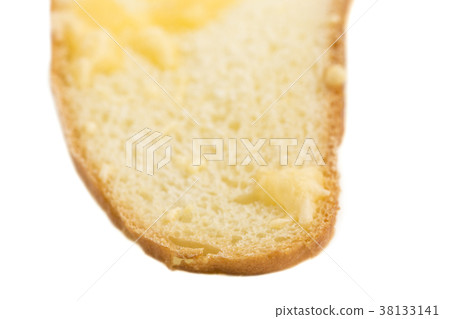 Slice of crouton with melted cheese. 38133141