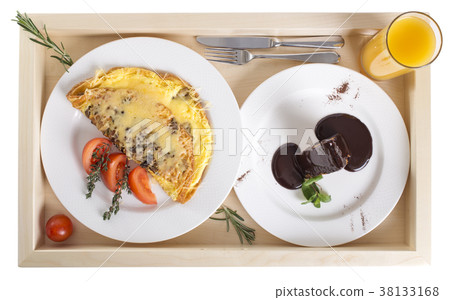 Omelet with dessert and juice. Omelet with dessert and juice. 38133168