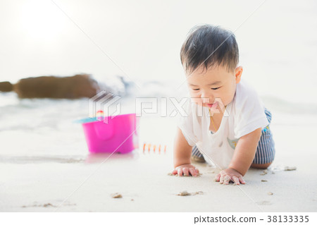 Asan baby play on the beach in Koh Kood 38133335