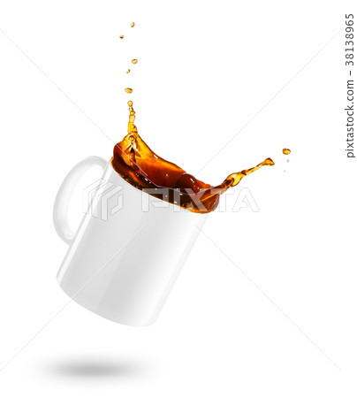 图库照片: mug of spilling coffee