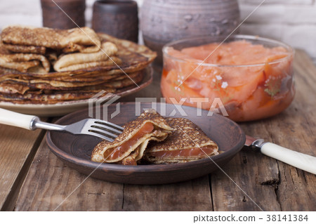 Pancakes of rye flour with salted salmon. 38141384